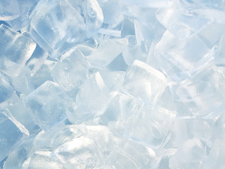 Ice cubes for background with blue light tone. or for cocktail drink