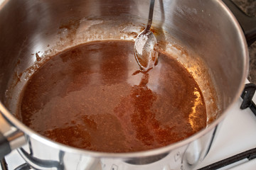 Do it yourself: Gingerbread cookies tutorial. Step by step recipe. Step 05. Put powdered sugar, honey, cinnamon, ginger, cocoa in a saucepan and heat it stirring constantly until smooth and combined