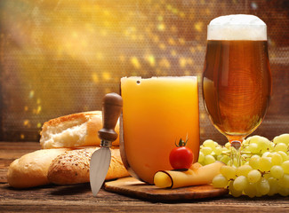 Piece of cheese and baguette with fruits for sandwich and beer - obrazy, fototapety, plakaty