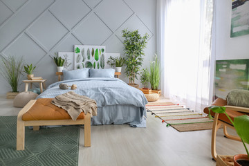 Stylish interior of modern bedroom