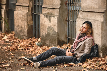 Portrait of poor homeless man outdoors