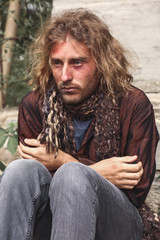 Obraz premium Portrait of poor homeless man outdoors