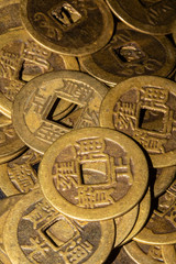 Obraz na płótnie Canvas Close Up of Golden Chinese Coins Cash
