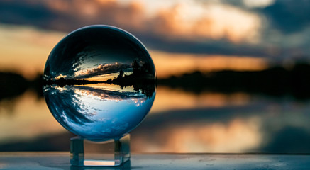 Crystal ball sunset shot at Plattling, Isar, Bavaria, Germany
