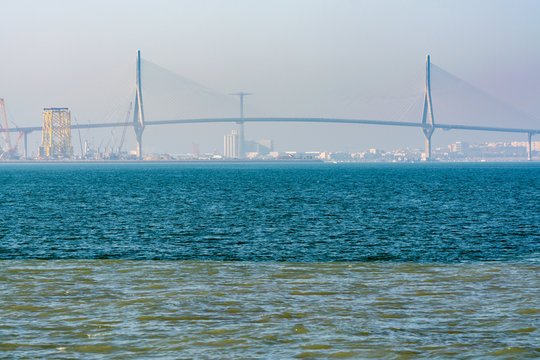 Halocline in water, visible border of fresh river water and salted ocean water with high salinity in Gulf of Cadiz, Andalusia, Spain