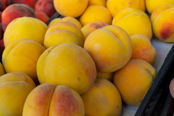 Sweet ripe juicy yellow peaches, healthy organic fruits