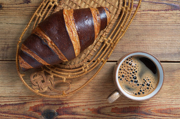 Chocolate croissant and coffee