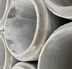 Stack of new concrete pipes.
