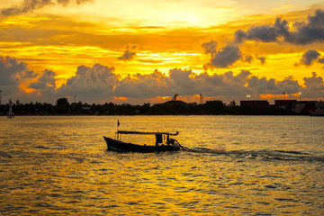 Local fishing boats fish in the sea, evening with beautiful light , Fishermen in Songkhla, Thailand