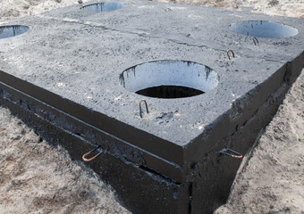 Manhole in the concrete block
