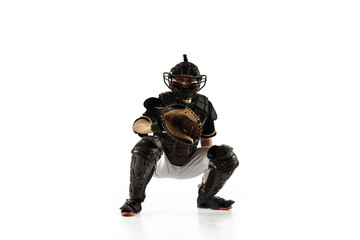 Baseball player, pitcher in a black uniform practicing and training isolated on a white background....