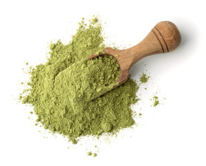 Wooden scoop of henna powder