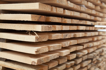 Wooden planks. Air-drying timber stack.