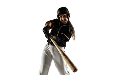Baseball player, pitcher in a black uniform practicing and training isolated on a white background. Young professional sportsman in action and motion. Healthy lifestyle, sport, movement concept.