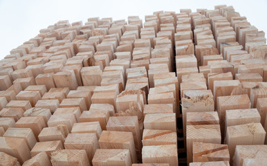 Wooden planks. Beams. Air-drying timber stack.