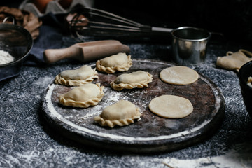 The process of making dumplings, pies in the kitchen