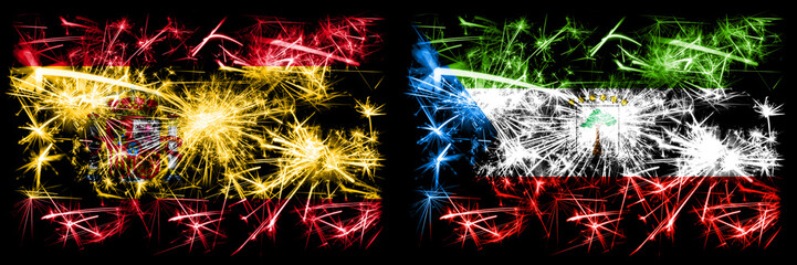 Spanish vs Equatorial Guinea New Year celebration sparkling fireworks flags concept background. Combination of two abstract states flags.