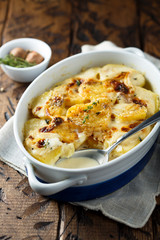 Homemade potato gratin with cream and cheese