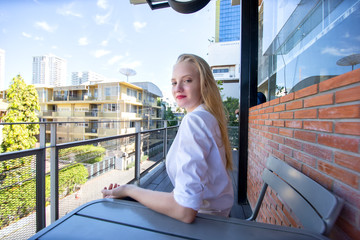 Fototapeta premium portrait of blond hair women white shirt smiling look at camera 