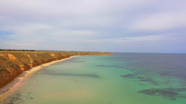Aerial view of wild beach, jungle and long coastline. Beautiful wild beach krym