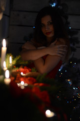 Beautiful Snow Maiden with gifts Christmas photo session in studio Christmas interior