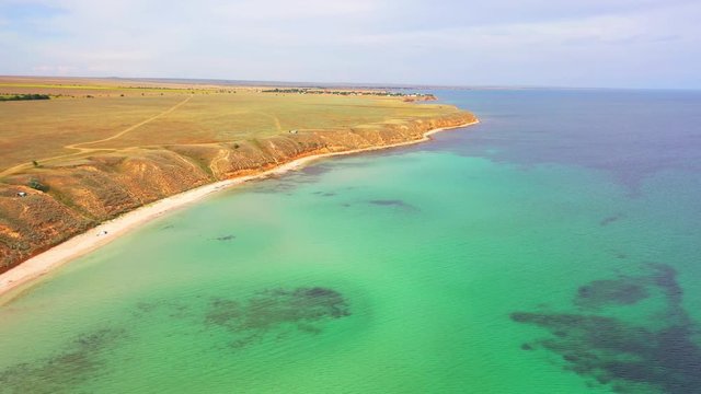 Aerial view of wild beach, jungle and long coastline. Beautiful wild beach krym