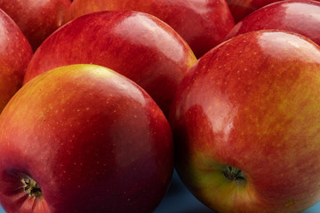 A bunch of big and ripe red apples.