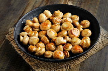Fried mushrooms in frying pan