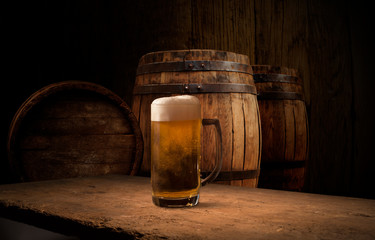 Old wooden barrel on a brown background