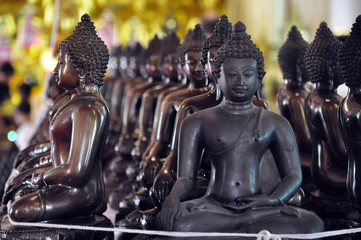 buddha statue on black background