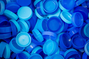 The plastic lid that is left over from the bottles are collected to be recycled into other items for reuse.