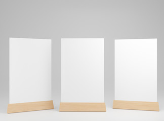 Menu frame standing on wood table isolated on white background with clipping path. space for text marketing promotion Bar restaurant ,Stand for booklets with white sheets of paper. 3d render