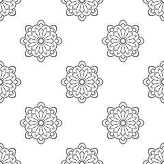 Abstract dotted seamless pattern with mandala flower. Mosaic, tile. Floral background. Vector illustration.     