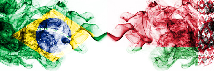 Brazil, Brazilian vs Belarus, Belarusian smoky mystic flags placed side by side. Thick colored silky abstract smoke flags combination