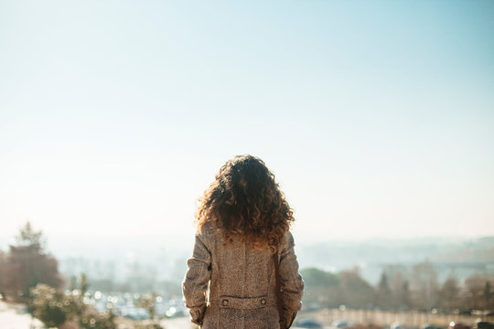 Woman Looking Out At The Horizon