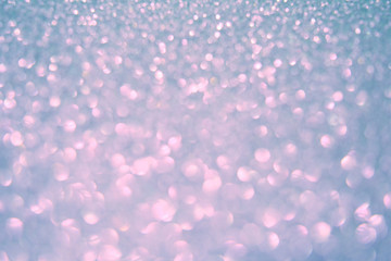 Beautiful Abstract Sparkle Glitter Lights Background. Soft Pale Pink Lilac Silver. Shine Bokeh Effect. For party, holidays, celebration.