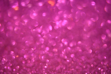 Beautiful Abstract Sparkle Glitter Lights Background. Bright Pink Fuchsia. Shine Bokeh Effect. For party, holidays, celebration.