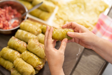Woman hands preparing delicious comfort food