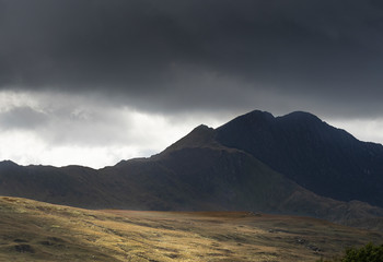 Wild hill landscape in wales with beautiful sky and colorful nature.