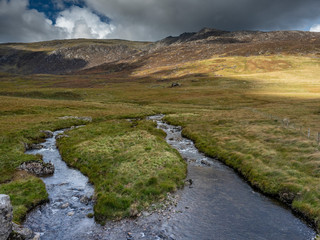 Wild hill landscape in wales with beautiful sky and colorful nature.