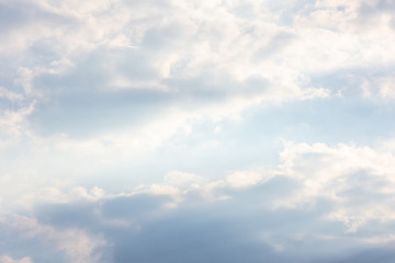blue clouds on the sky in the rays of the sun in the fall. Landscape background texture, copy space