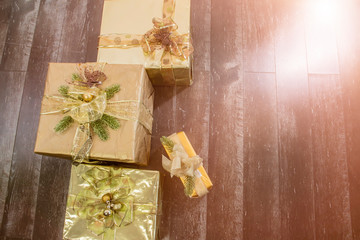 Merry Christmas card made of gift boxes. Xmas and New Year holiday,   bokeh, light. Flat lay, top view, wide composition