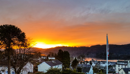 Obraz premium Bowness On Windermere, Cumbria, United Kingdom - Beautiful sunset over popular Bowness town in the Lake District, UK.