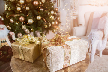 Merry Christmas card made of gift boxes. Xmas and New Year holiday,   bokeh, light. Flat lay, top view, wide composition