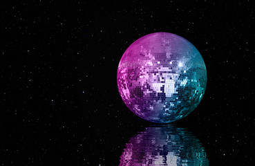 Party disco mirror ball reflecting on the water - purple lights