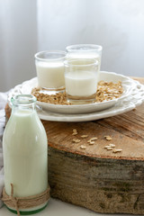 Obraz na płótnie Canvas Fresh oat milk drink. Healthy nutritional ingredient, dairy themes