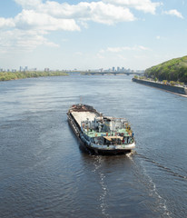 The barge floating in the Dnieper river