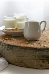 Fresh oat milk drink. Healthy nutritional ingredient, dairy themes