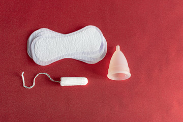 Set of menstrual cup, sanitary pads and tampons. Best way for woman menstrual protection.