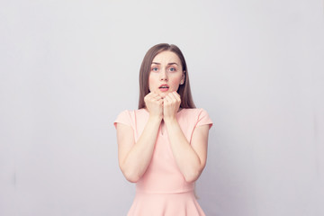 Stunned amazed woman girl, woman reacts to unexpected news, portrait, copy space, toned